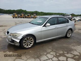 2011 BMW 3 Series 328i with VIN WBAPH7C58BE679011, listed as a Copart auction lot 58160605 with 148,388 mi miles and Salvage title. Bid and sale history available at DreamBid. Image 1.