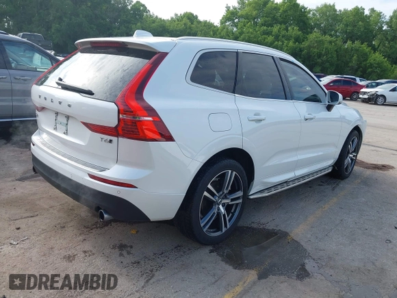 2021 Volvo XC60 Momentum with VIN YV4A22RK8M1696361, listed as a IAAI auction lot 42345602 with 68,574 mi miles and . Bid and sale history available at DreamBid. Image 4.