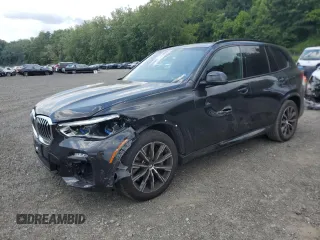2020 BMW X5 xDrive40i with VIN 5UXCR6C03L9C96098, listed as a Copart auction lot 65205895 with 56,566 mi miles and Salvage title. Bid and sale history available at DreamBid. Image 1.