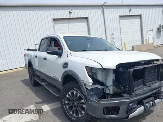 2017 Nissan Titan SV with VIN 1N6AA1E50HN540827, listed as a IAAI auction lot 42105294 with 139,914 mi miles and . Bid and sale history available at DreamBid. Image 1.