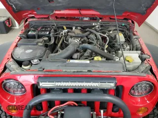 2007 Jeep Wrangler X с VIN 1J4FA241X7L111082, выставлен на аукционе Copart как лот 57556715 с пробегом 73 322 миль миль и Списание • Salvage title. История ставок и продаж доступна на DreamBid. Изображение 12.