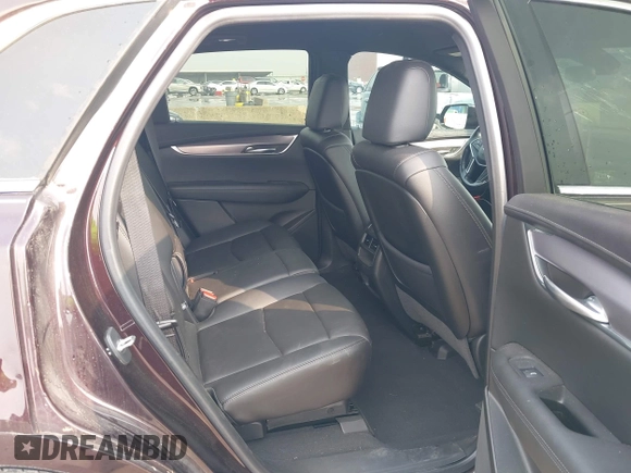 2021 Cadillac XT5 FWD Luxury with VIN 1GYKNAR44MZ184070, listed as a IAAI auction lot 41934265 with 60,596 mi miles and . Bid and sale history available at DreamBid. Image 8.