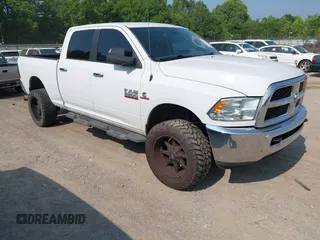 2015 Ram 2500 Outdoorsman z VIN 3C6UR5DL8FG669864, wystawiony jako IAAI lot #42285149 z przebiegiem 142 985 mil mil oraz . Historia ofert i sprzedaży dostępna na DreamBid. Obrazek 1.