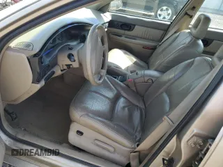 2002 Buick Regal LS z VIN 2G4WB55K421101234, wystawiony jako Copart lot #54744355 z przebiegiem Nie podano mil oraz Szkoda całkowita • Salvage title. Historia ofert i sprzedaży dostępna na DreamBid. Obrazek 7.