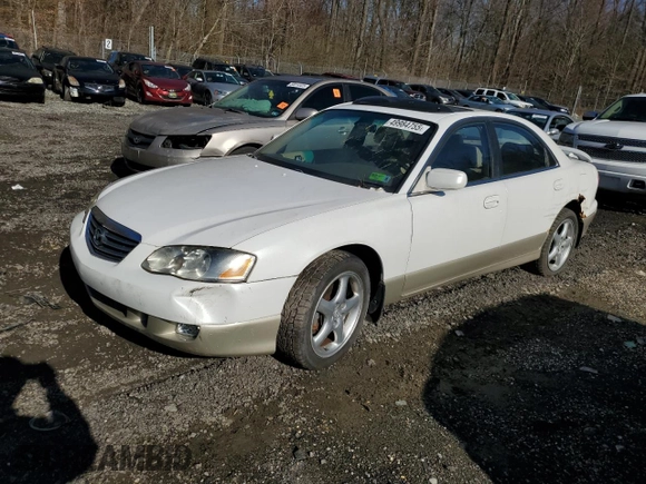 2002 Mazda Millenia S z VIN JM1TA222521733260, wystawiony jako Copart lot #49984755 z przebiegiem 140 212 mil mil oraz Szkoda całkowita • Salvage title. Historia ofert i sprzedaży dostępna na DreamBid. Obrazek 1.