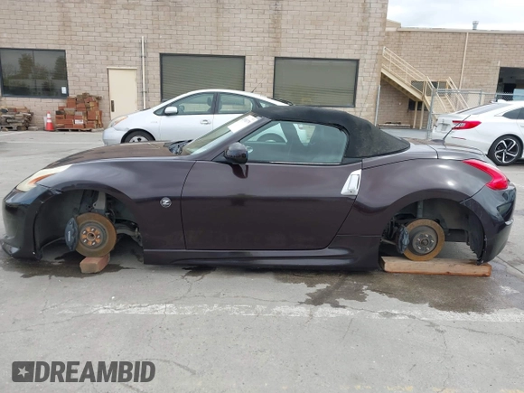 2010 Nissan 370Z Touring with VIN JN1AZ4FH3AM301311, listed as a IAAI auction lot 41976379 with 51,347 mi miles. Bid and sale history available at carsss.com. Image 14.