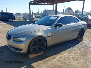 2007 BMW 3 Series 335i with VIN WBAWL73587PX49841, listed as a IAAI auction lot 41321892 with 173,556 mi miles. Bid and sale history available at carsss.com. Image 22.