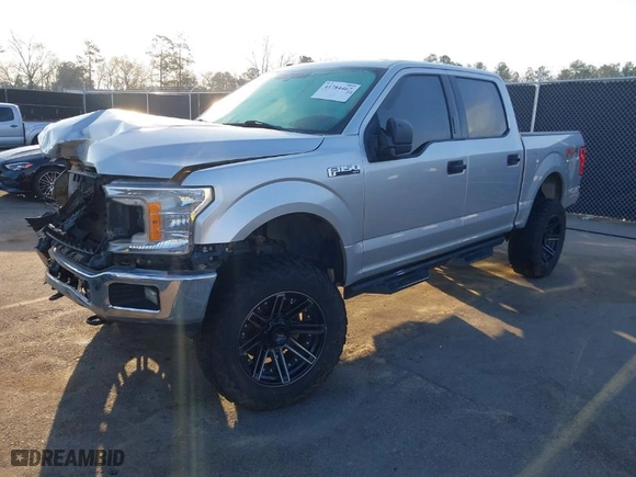 2018 Ford F-150 XL with VIN 1FTEW1E57JFC31779, listed as a IAAI auction lot 41784467 with 142,676 mi miles. Bid and sale history available at carsss.com. Image 2.