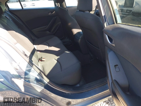 2015 Mazda 3 i Sport with VIN 3MZBM1K78FM185981, listed as a IAAI auction lot 42057365 with 80,934 mi miles and . Bid and sale history available at DreamBid. Image 8.