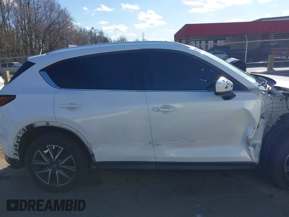 2018 Mazda CX-5 Grand Touring with VIN JM3KFBDM6J0435579, listed as a IAAI auction lot 41208899 with 131,212 mi miles. Bid and sale history available at carsss.com. Image 14.