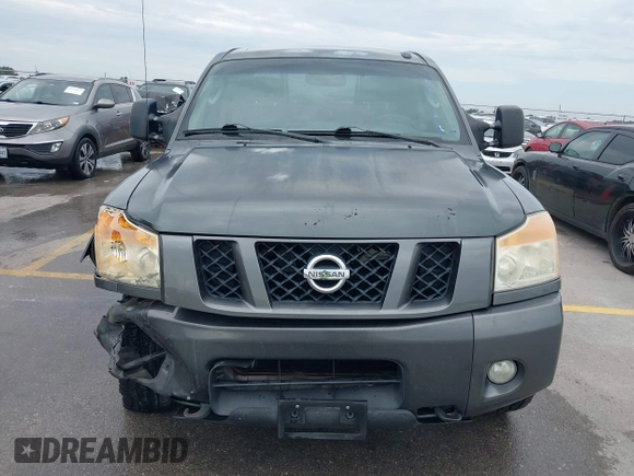 2010 Nissan Titan Pro-4X with VIN 1N6BA0EC9AN323943, listed as a IAAI auction lot 42795482 with 200,453 mi miles and . Bid and sale history available at DreamBid. Image 12.