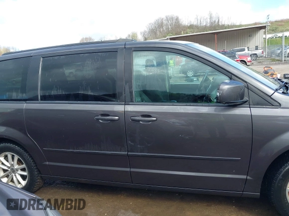 2015 Dodge Grand Caravan SXT with VIN 2C4RDGCG8FR541373, listed as a IAAI auction lot 41990500 with 114,100 mi miles and . Bid and sale history available at DreamBid. Image 13.