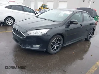 2015 Ford Focus SE with VIN 1FADP3F22FL240476, listed as a IAAI auction lot 41739722 with 159,179 mi miles. Bid and sale history available at carsss.com. Image 2.