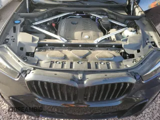 2025 BMW X5 sDrive40i with VIN 5UX13EU00S9X87029, listed as a Copart auction lot 47133705 with 8,616 mi miles and Salvage Title. Bid and sale history available at carsss.com. Image 12.