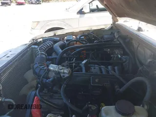 2002 Ford Ranger XL with VIN 1FTYR14V52PB19015, listed as a IAAI auction lot 42056802 with 294,811 mi miles and . Bid and sale history available at carsss.com. Image 10.