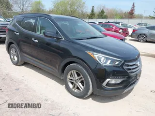 2017 Hyundai Santa Fe 2.4L with VIN 5XYZUDLB1HG413194, listed as a IAAI auction lot 42179718 with 136,857 mi miles and . Bid and sale history available at DreamBid. Image 1.