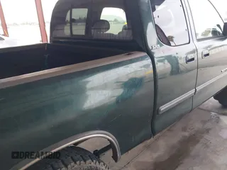 2003 Toyota Tundra SR5 with VIN 5TBRT34133S345035, listed as a IAAI auction lot 41700784 with 372,478 mi miles and . Bid and sale history available at DreamBid. Image 6.