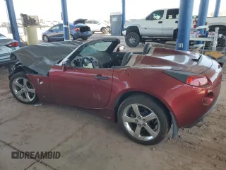 2009 Pontiac Solstice GXP z VIN 1G2MT35X59Y105815, wystawiony jako Copart lot #74302574 z przebiegiem Nie podano mil oraz Szkoda całkowita • Salvage title. Historia ofert i sprzedaży dostępna na DreamBid. Obrazek 2.