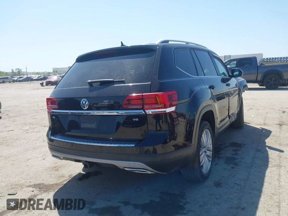 2019 Volkswagen Atlas SE with VIN 1V2WR2CA4KC595211, listed as a IAAI auction lot 41986643 with 96,299 mi miles and . Bid and sale history available at DreamBid. Image 4.