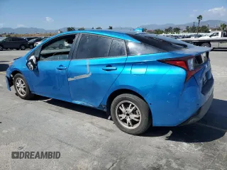 2022 Toyota Prius L Eco with VIN JTDKAMFU0N3157329, listed as a Copart auction lot 57233685 with 105,206 mi miles and Salvage Title. Bid and sale history available at DreamBid. Image 2.