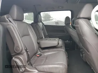 2018 Honda Odyssey Elite z VIN 5FNRL6H94JB107589, wystawiony jako Copart lot #58347385 z przebiegiem 98 761 mil mil oraz Szkody całkowita. Historia ofert i sprzedaży dostępna na DreamBid. Obrazek 11.