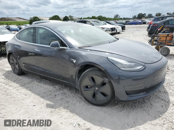 2019 Tesla Model 3 Mid Range z VIN 5YJ3E1EA4KF434741, wystawiony jako Copart lot #53857935 z przebiegiem Nie podano mil oraz Szkody całkowita. Historia ofert i sprzedaży dostępna na DreamBid. Obrazek 4.