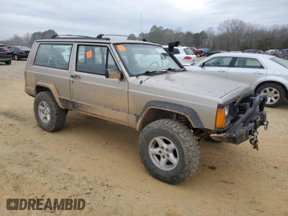 1993 Jeep Cherokee Sport with VIN 1J4FJ67S6PL580133, listed as a Copart auction lot 43230005 with 122,173 mi miles and Salvage Title. Bid and sale history available at carsss.com. Image 4.