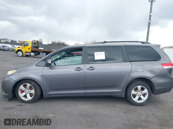 2013 Toyota Sienna LE with VIN 5TDJK3DC1DS049621, listed as a IAAI auction lot 42027930 with 206,148 mi miles and . Bid and sale history available at DreamBid. Image 14.