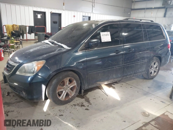 2010 Honda Odyssey Touring with VIN 5FNRL3H98AB095042, listed as a IAAI auction lot 41394894 with 254,525 mi miles. Bid and sale history available at carsss.com. Image 2.