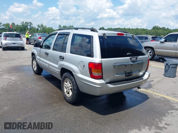 2004 Jeep Grand Cherokee Laredo with VIN 1J4GX48S34C258227, listed as a IAAI auction lot 42616107 with 160,424 mi miles and . Bid and sale history available at DreamBid. Image 3.