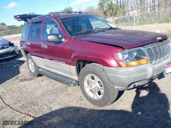 1999 Jeep Grand Cherokee Laredo with VIN 1J4GW58S5XC781472, listed as a IAAI auction lot 41738515 with 216,000 mi miles. Bid and sale history available at carsss.com. Image 1.