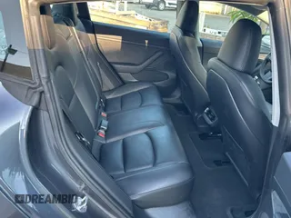 2023 Tesla Model 3 with VIN 5YJ3E1EA1PF607137, listed as a Copart auction lot 62613375 with 27,271 mi miles and Clean title. Bid and sale history available at DreamBid. Image 6.