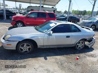 2001 Honda Prelude with VIN JHMBB62421C003129, listed as a IAAI auction lot 41989431 with 225,130 mi miles and . Bid and sale history available at DreamBid. Image 14.