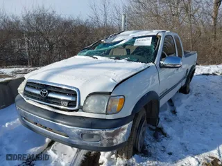 2001 Toyota Tundra SR5 with VIN 5TBRT34151S201015, listed as a IAAI auction lot 41590654 with 317,220 mi miles. Bid and sale history available at carsss.com. Image 2.