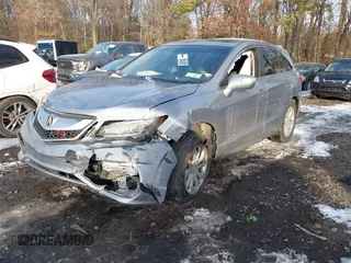 2016 Acura RDX with VIN 5J8TB4H39GL002899, listed as a IAAI auction lot 41384985 with 146,979 mi miles. Bid and sale history available at carsss.com. Image 2.