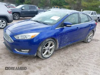 2015 Ford Focus Titanium with VIN 1FADP3J27FL298882, listed as a IAAI auction lot 42117247 with 124,185 mi miles and . Bid and sale history available at carsss.com. Image 22.
