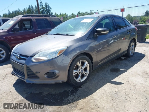 2013 Ford Focus SE z VIN 1FADP3F26DL266821, wystawiony jako IAAI lot #42677519 z przebiegiem 155 238 mil mil oraz . Historia ofert i sprzedaży dostępna na DreamBid. Obrazek 2.