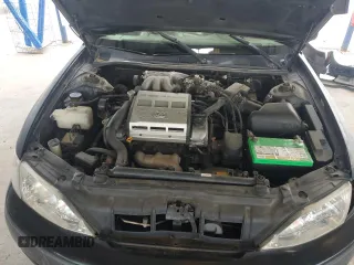 1998 Lexus ES 300 z VIN JT8BF28G7W5048920, wystawiony jako Copart lot #56391015 z przebiegiem 234 109 mil mil oraz Nie do naprawy • Non repairable. Historia ofert i sprzedaży dostępna na DreamBid. Obrazek 11.