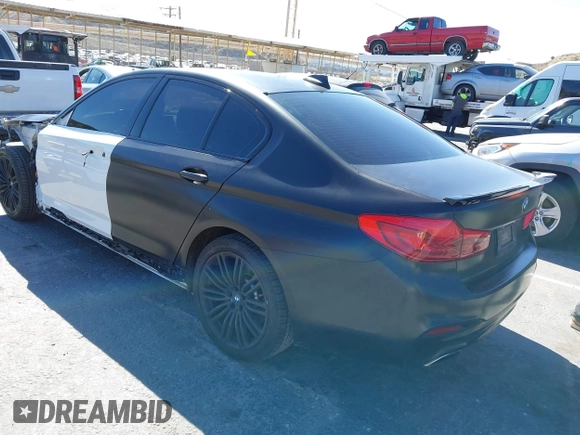 2020 BMW 5 Series 530e with VIN WBAJA9C02LCD31800, listed as a IAAI auction lot 41669765 with 99,024 mi miles and . Bid and sale history available at DreamBid. Image 3.