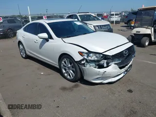 2015 Mazda 6 i Touring with VIN JM1GJ1T62F1170073, listed as a IAAI auction lot 42408740 with 131,349 mi miles and . Bid and sale history available at DreamBid. Image 1.