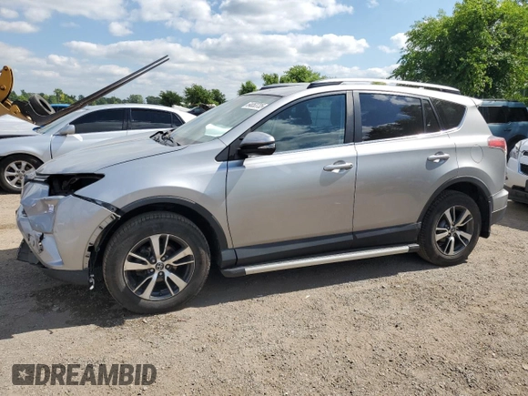 2018 Toyota RAV4 LE with VIN 2T3BFREV8JW788362, listed as a Copart auction lot 64053735 with 124,668 mi miles and Salvage title. Bid and sale history available at DreamBid. Image 1.