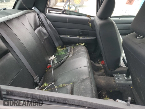 2009 Ford Police Interceptor с VIN 2FAHP71V39X111972, выставлен на аукционе Copart как лот 59130445 с пробегом 188 179 миль миль и Списание • Salvage title. История ставок и продаж доступна на DreamBid. Изображение 10.