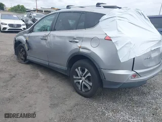 2016 Toyota RAV4 LE with VIN 2T3ZFREV2GW249128, listed as a IAAI auction lot 41696489 with 115,816 mi miles. Bid and sale history available at carsss.com. Image 3.