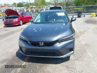 2024 Honda Civic LX z VIN 19XFL2H57RE021316, wystawiony jako IAAI lot #42031580 z przebiegiem 18 598 mil mil oraz . Historia ofert i sprzedaży dostępna na DreamBid. Obrazek 12.