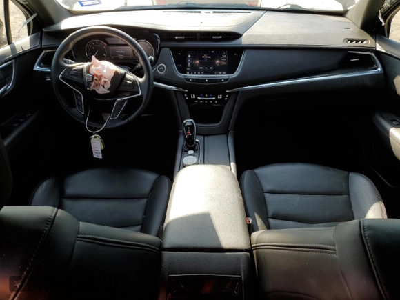 2021 Cadillac XT5 FWD Premium Luxury with VIN 1GYKNCRS2MZ180884, listed as a Copart auction lot 50433445 with 27,246 mi miles and Salvage Title. Bid and sale history available at carsss.com. Image 8.