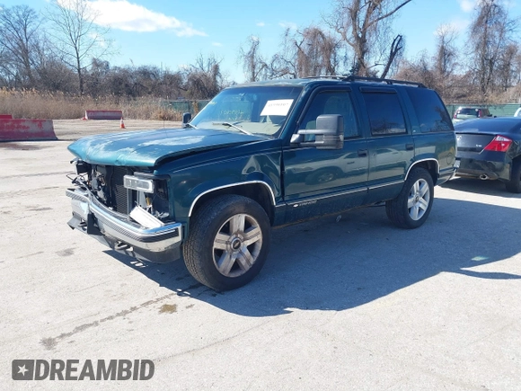 1999 Chevrolet Tahoe Z71 z VIN 1GNEK13R2XJ325602, wystawiony jako IAAI lot #41590107 z przebiegiem 204 611 mil mil oraz . Historia ofert i sprzedaży dostępna na DreamBid. Obrazek 2.