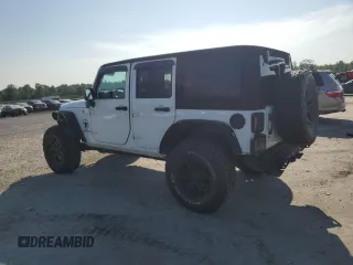 2016 Jeep Wrangler Unlimited Sport with VIN 1C4BJWDG0GL187779, listed as a Copart auction lot 62480015 with 109,296 mi miles and Salvage title. Bid and sale history available at DreamBid. Image 2.