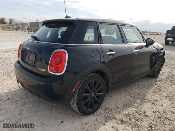 2021 MINI Hardtop 4 Door Oxford Edition with VIN WMWXU7C09M2N79553, listed as a Copart auction lot 84939724 with 59,139 mi miles and Salvage Title. Bid and sale history available at carsss.com. Image 3.