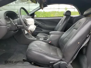 2002 Ford Mustang Deluxe с VIN 1FAFP44422F128062, выставлен на аукционе Copart как лот 57081075 с пробегом 85 392 миль миль и Чистый • Clean title. История ставок и продаж доступна на DreamBid. Изображение 7.