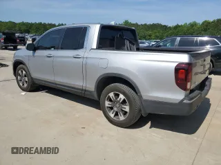 2019 Honda Ridgeline RTL-T with VIN 5FPYK3F67KB031672, listed as a Copart auction lot 55080205 with 106,912 mi miles and Salvage title. Bid and sale history available at DreamBid. Image 2.